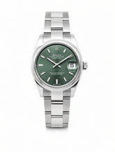 Capri Watches Rolex datejust 31mm green dial oyster watch